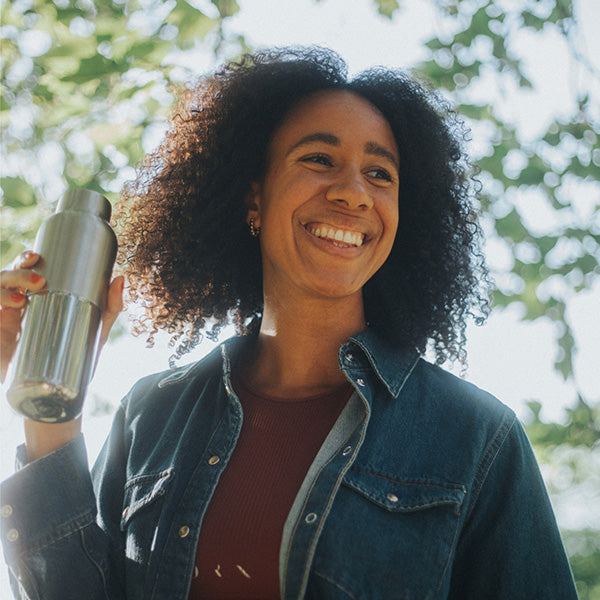 bring-your-own-party-kit-tumblers-and-cocktails-v7 16oz_rise_reflect_woman_smile_square.jpg