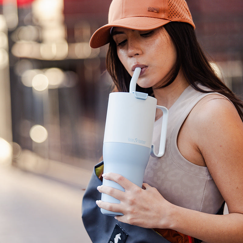 36oz-rise-tumbler-with-straw-lid-n5 36oz_rise_tumbler_straw_girl_sip_square.jpg