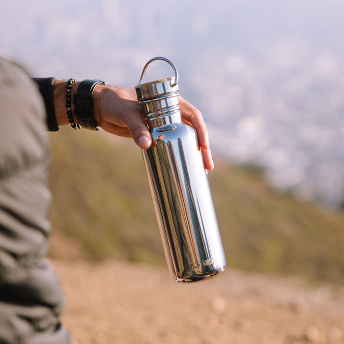 27oz-reflect-with-bamboo-cap-r5 K27SSLRF-MS-BAMBOO_reflect_bottle_hand_lifestyle.jpg