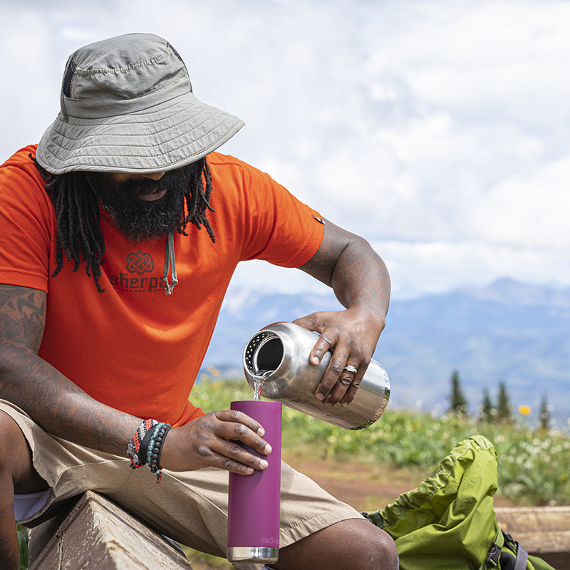 64oz-tkwide-with-loop-cap-y5 tkwide_64oz_bottle_backpacker_mountains_filling_square.jpg