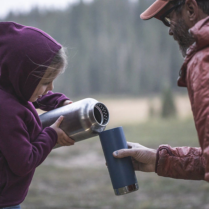 64oz-tkwide-with-loop-cap-y5 tkwide_64oz_bottle_girl_dad_filling_square.jpg